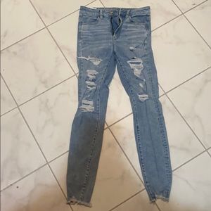 light wash skinny ripped jeans
